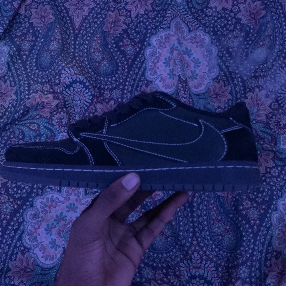 Travis Scott low top Jordan’s ones phantom black